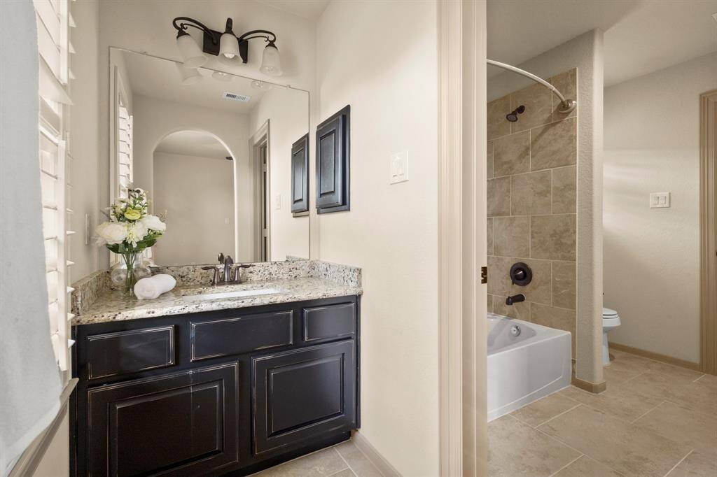 Two rooms upstairs have a connecting bathroom