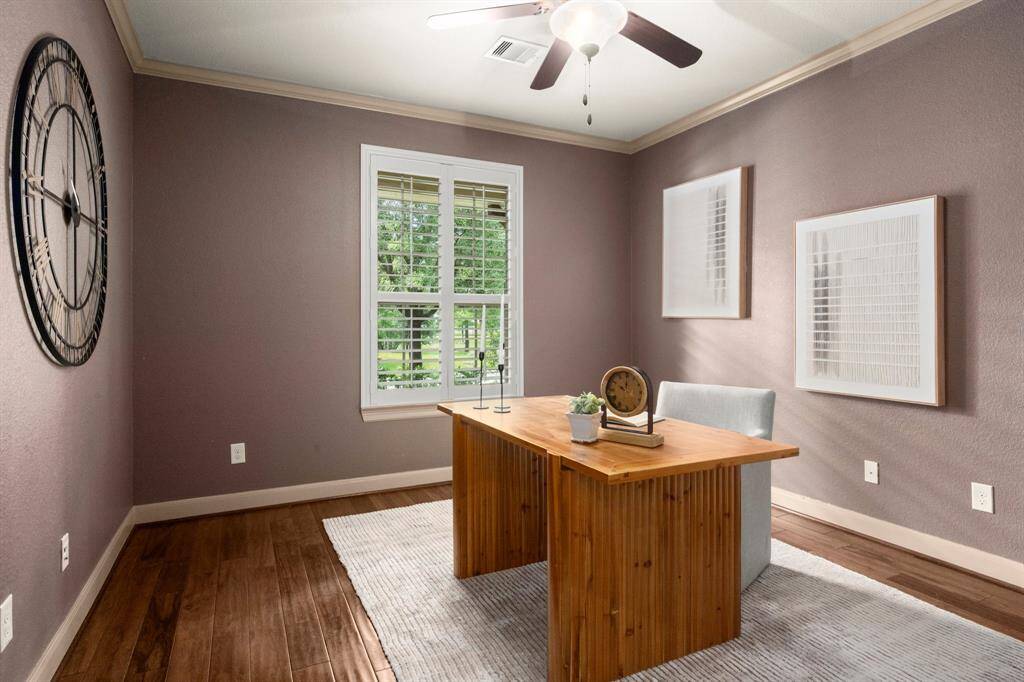 Room to your left as you enter the home, currently used as an office