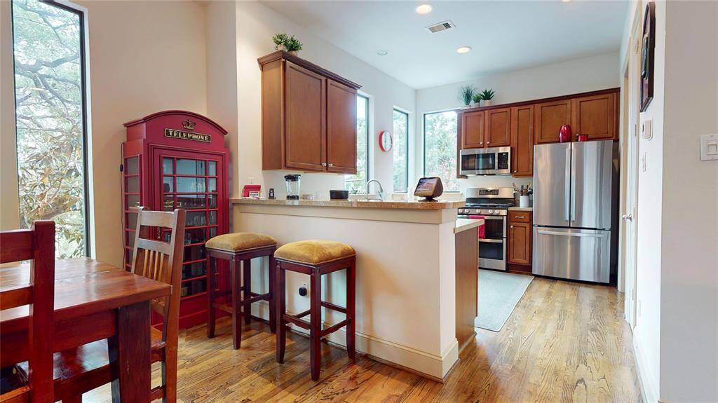 Open floorplan with large kitchen - the laundry area is off the kitchen to the right of the picture