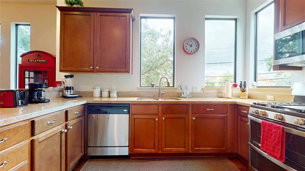 ... all the cabinets are the same color :-) the light is playing on them...