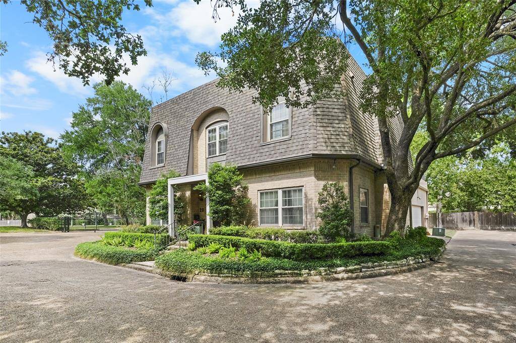 Welcome to 20 Bayou Pointe Drive located in a gated community in Woodlake Forest!