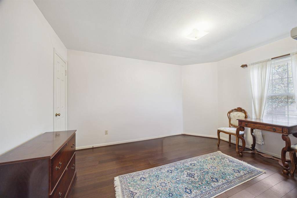 Third bedroom on the second floor with walk-in closet.