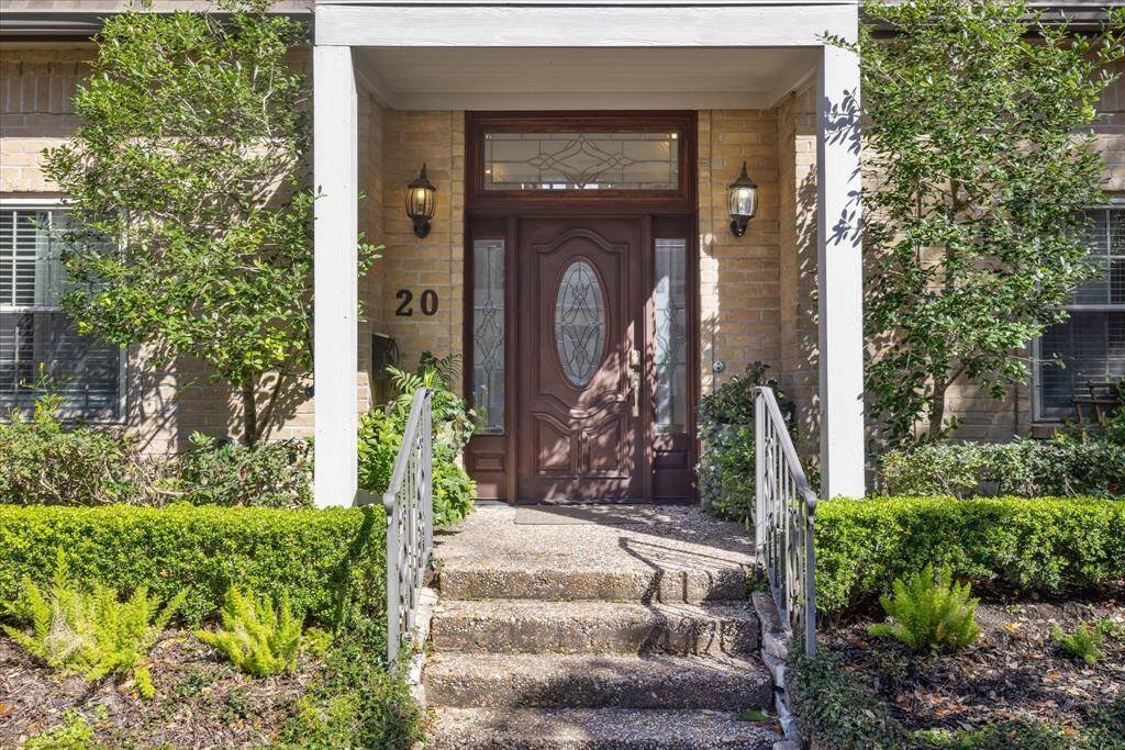 Covered front porch with elegant sconces