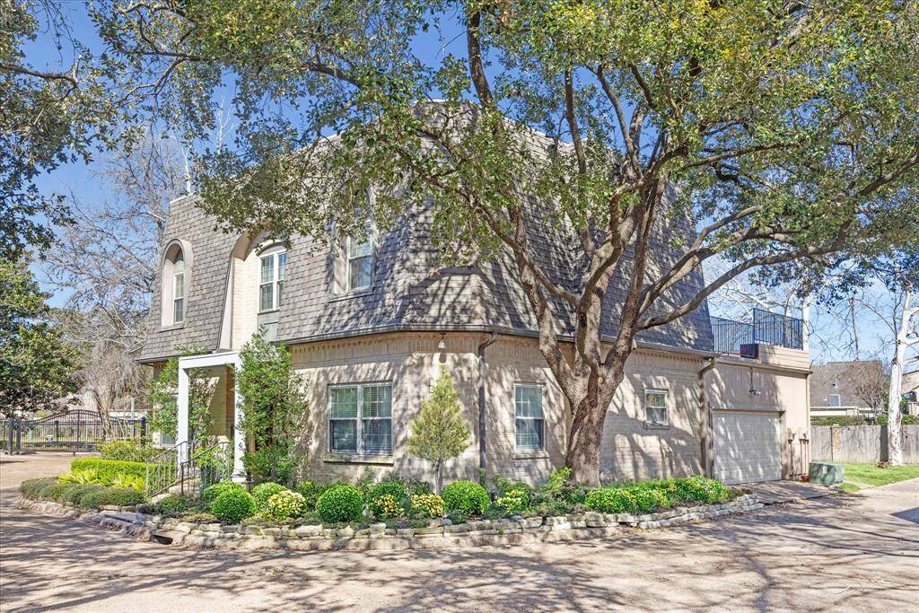 This house is situated on a corner lot and has its own garage in the gated community of Bayou Pointe