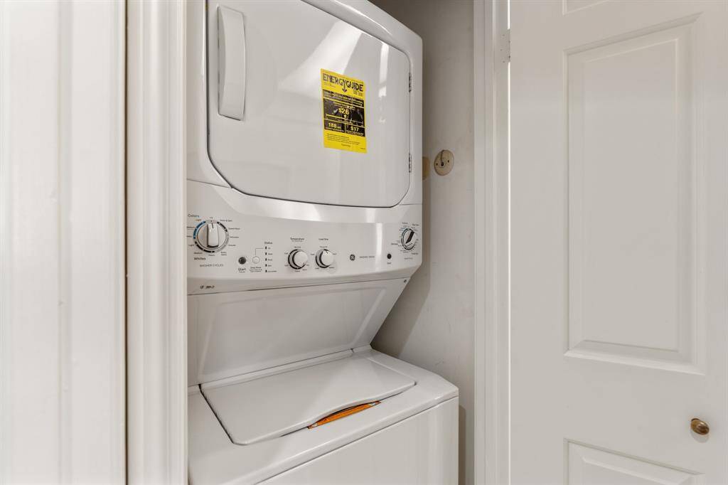 Washer/dryer at kitchen.