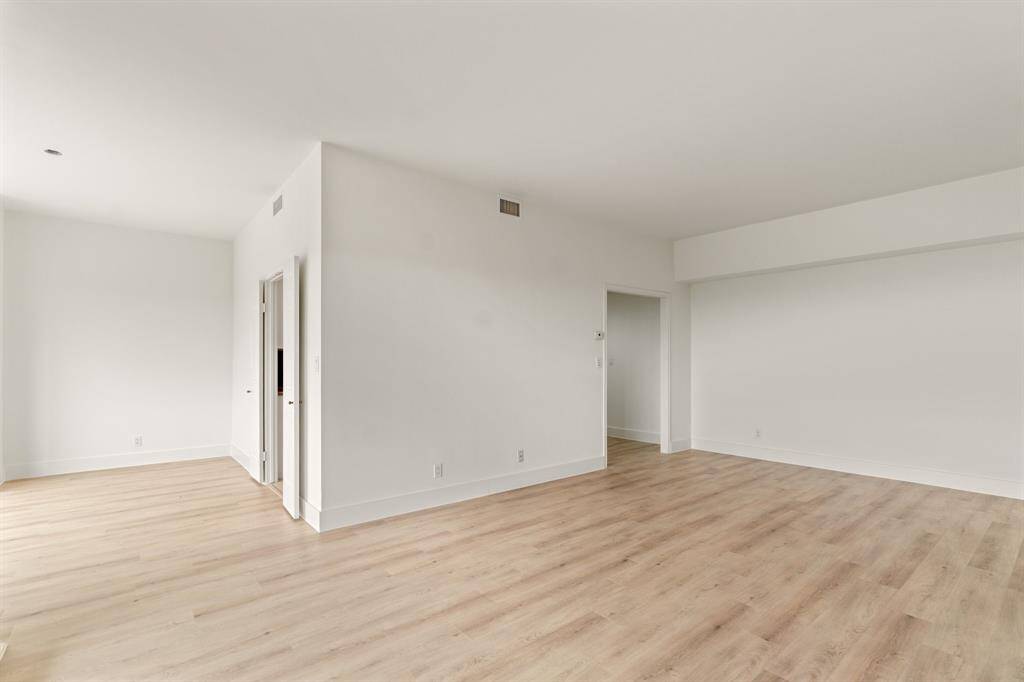 Dining on the left and access to the entry on the right of photo.