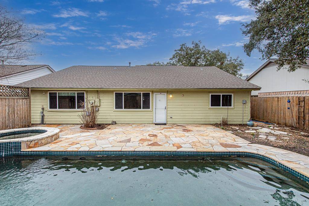 Alternate view of your low maintenance backyard highlights how beautifully the property has been maintained.  The roofing and siding have recently been replaced.  Gutters and a storm door