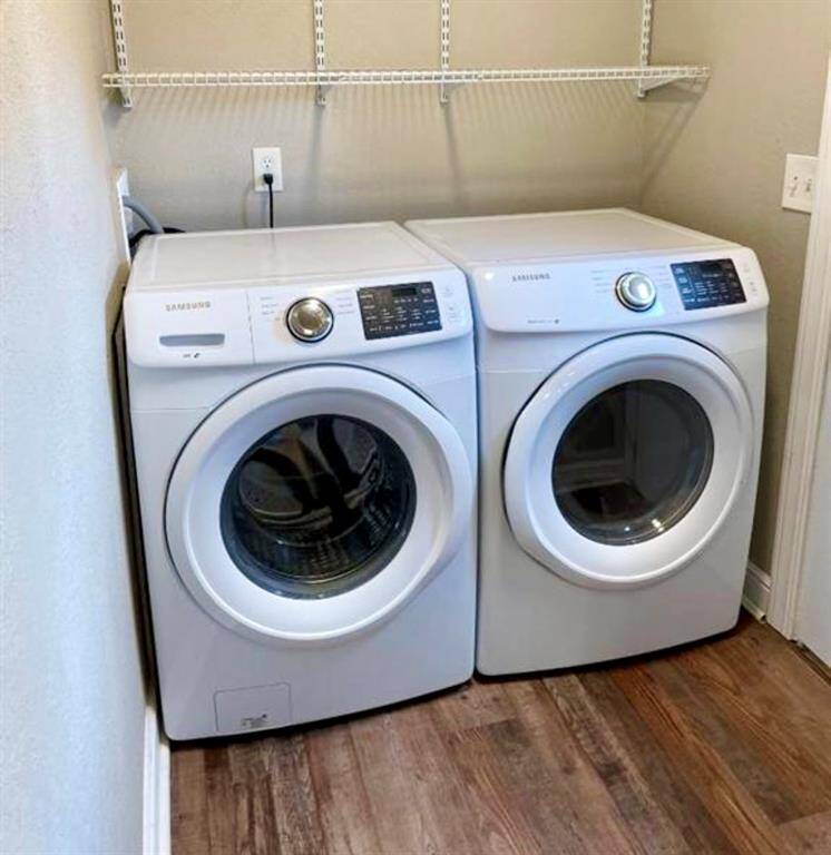 Utility Closet with Side By Side Washer and Dryer