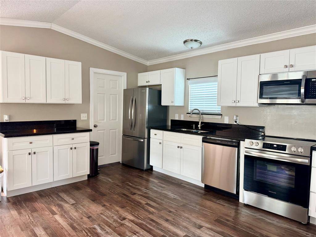 Kitchen with NEW Stainless Steel Appliances