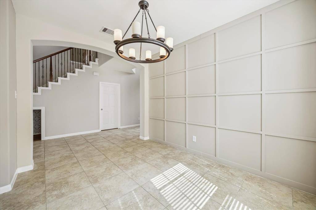 Another view of the formal dining space