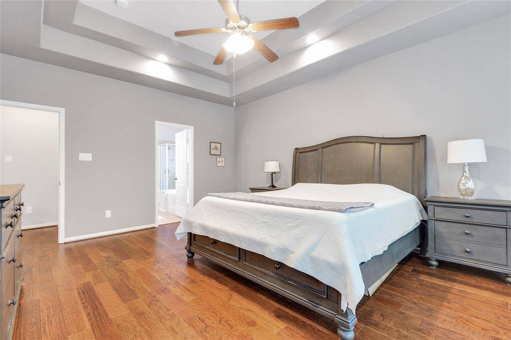 The primary suite is complete with a lovely bathroom and awesome walk in closet to boot.