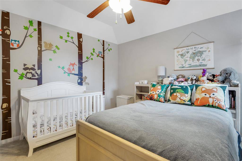 Isn't this bedroom just darling?   Three nice sized bedrooms upstairs with two full baths, including a jack-n-jill style bathroom with two vanities.