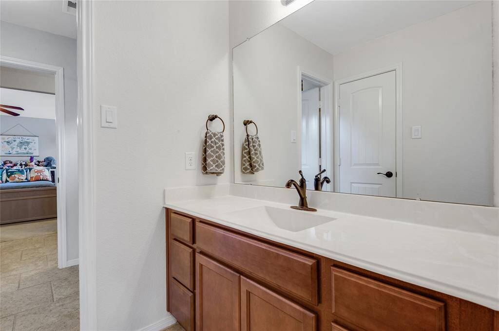 Part of the jack-n-jill style bathroom.  This one has an awesome oversized vanity.