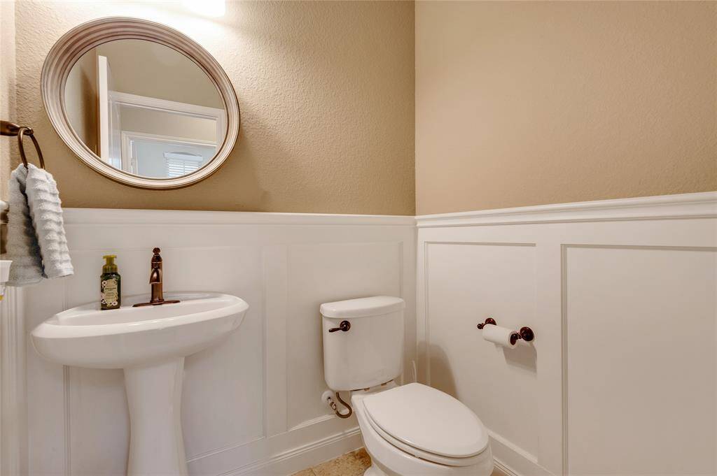 Guest powder room on the first floor for convenience.