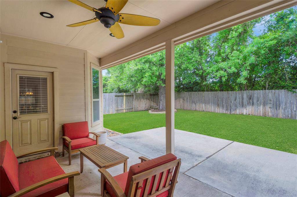 Ahhhhhhh what a lovely place to relax and unwind from a long day.   Green space is behind the home so no back neighbors!