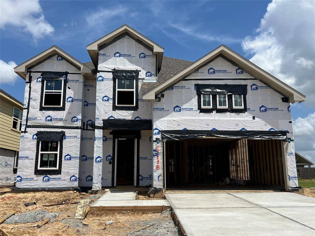 Two-story home with 4 bedrooms, 3.5 baths and 2 car garage on a corner lot