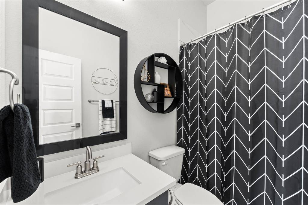 Full bathroom #2 off of the secondary bedroom #2.  It is not attached, but just across the hall.