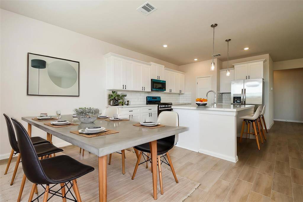 This dining space is perfect for casual dining or entertaining guests.
