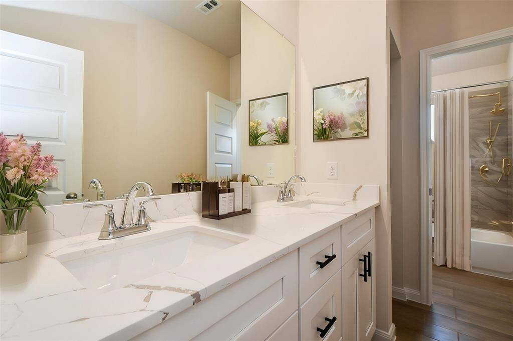 Discover the next bathroom that is bright and airy and beautiful cabinetry that offers ample storage.