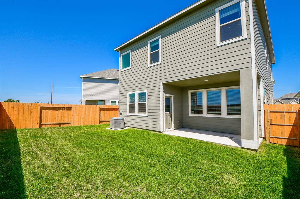 Step out onto this covered patio.