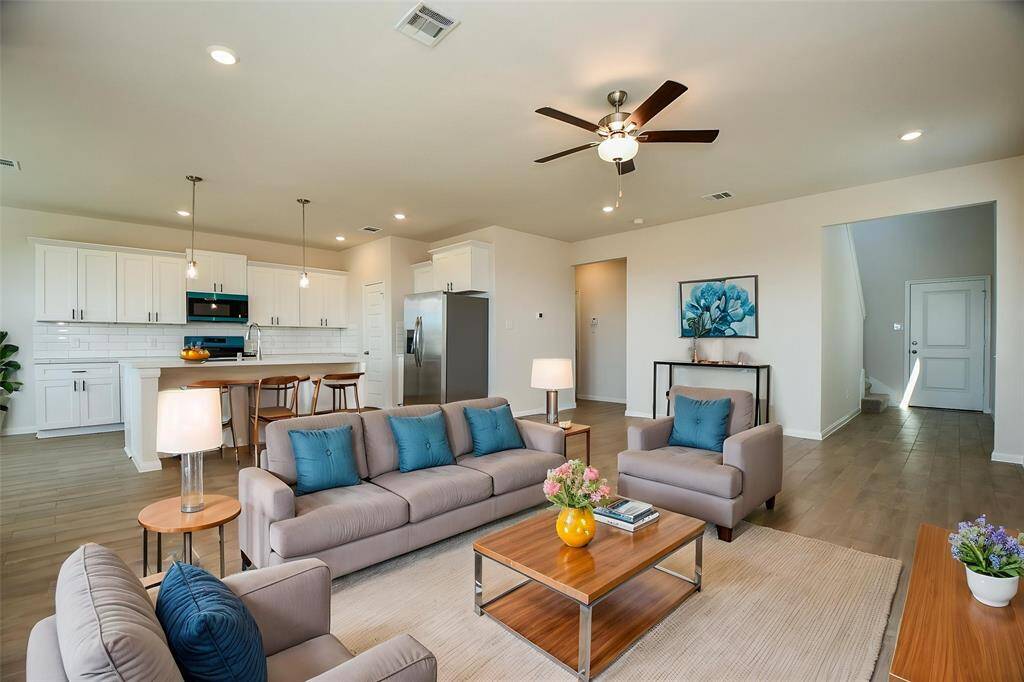 Notice the open-concept floor plan makes everything accessible.