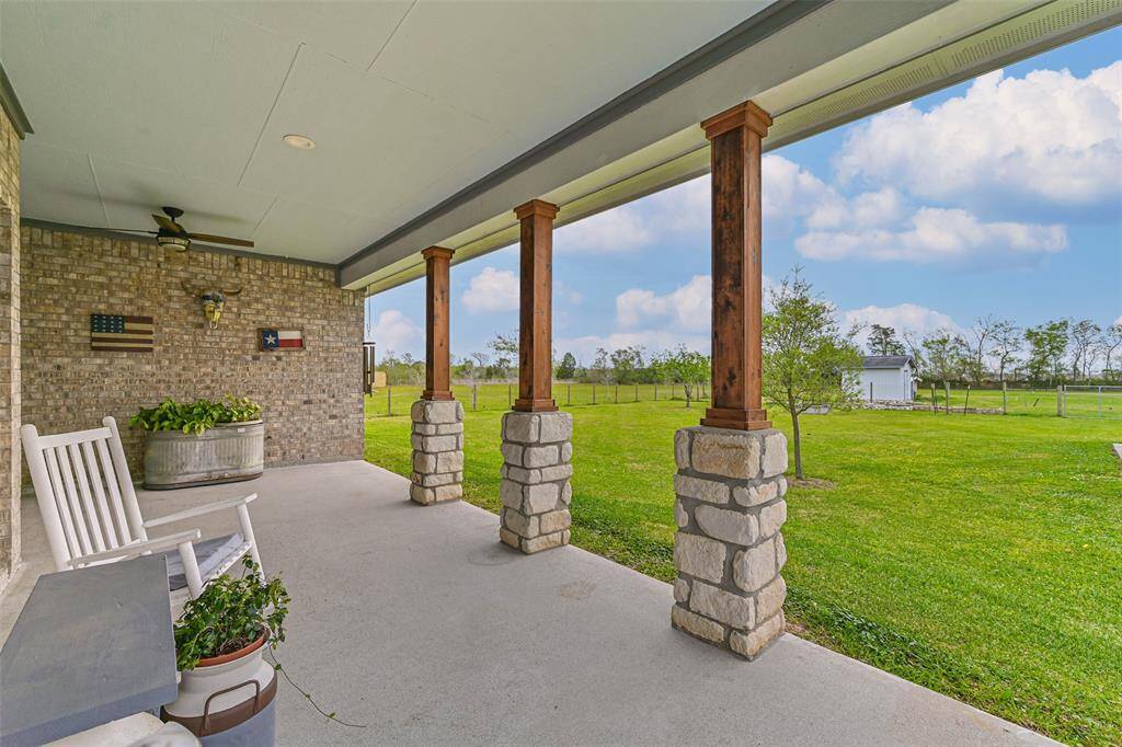 Covered back patio on the main house