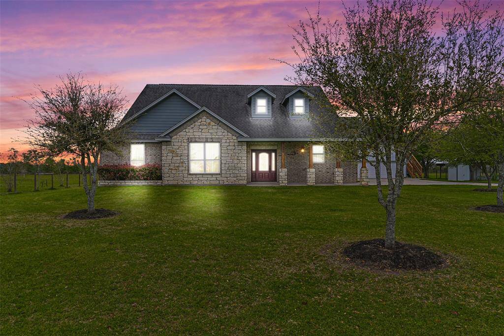 Country living close to city amenities. Custom built home located on 1.925 acres with a garage apartment.