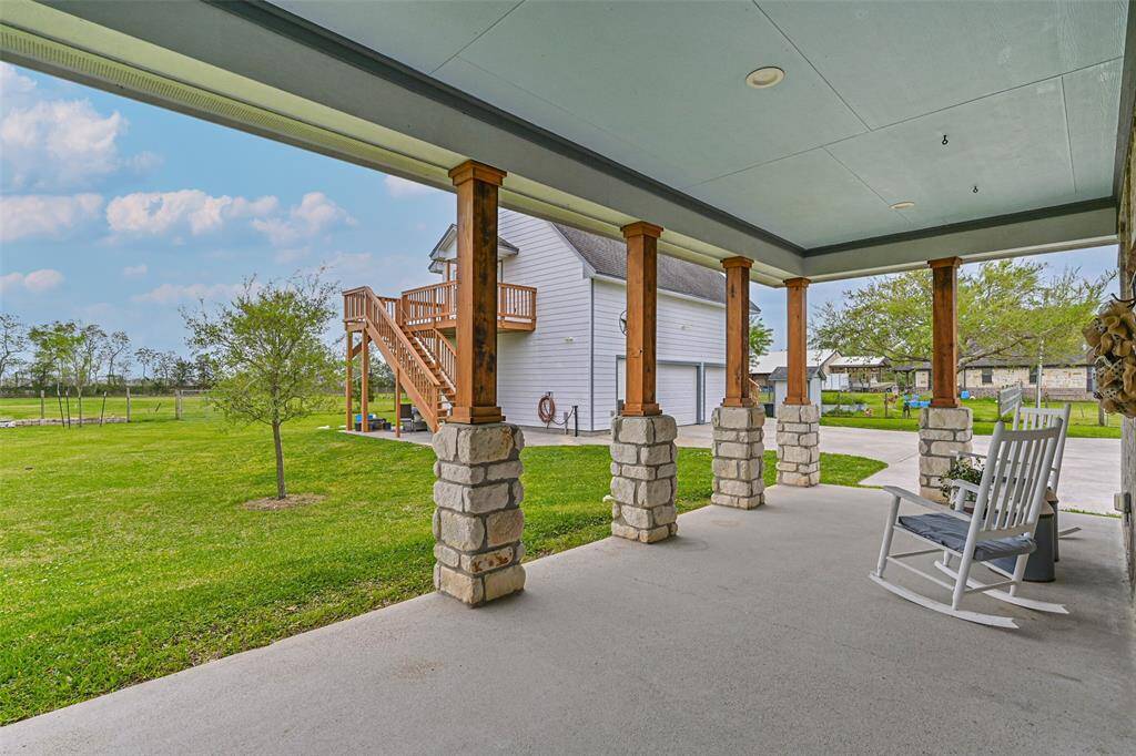 Covered back patio on the main house