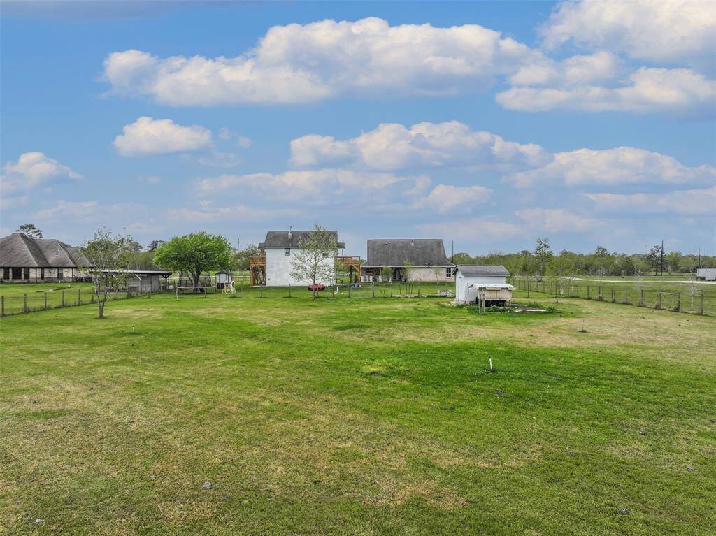 Country living close to city amenities. Custom built home located on 1.9 acres with a garage apartment.