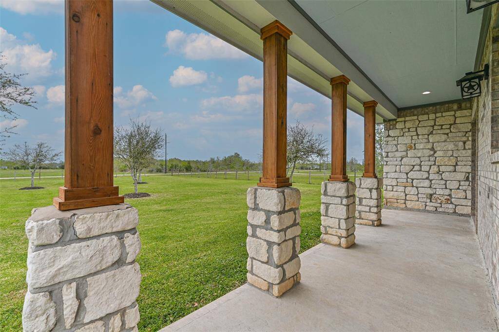Covered front porch to the main house