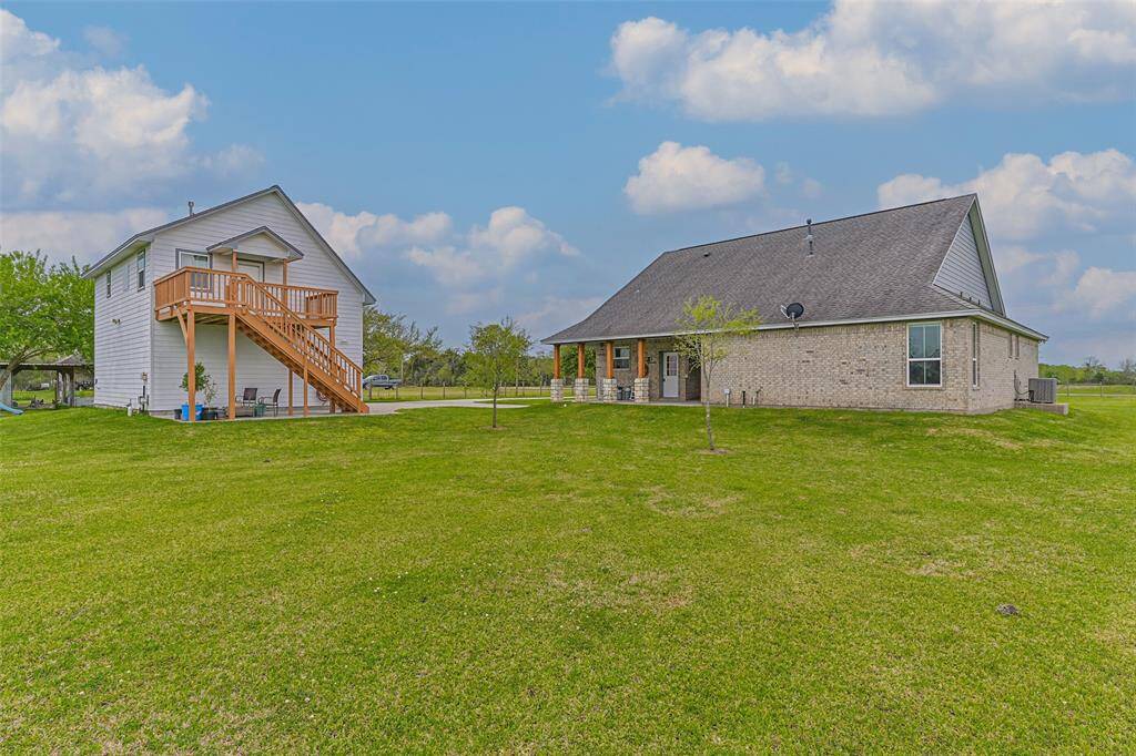 Country living close to city amenities. Custom built home located on 1.9 acres with a garage apartment.