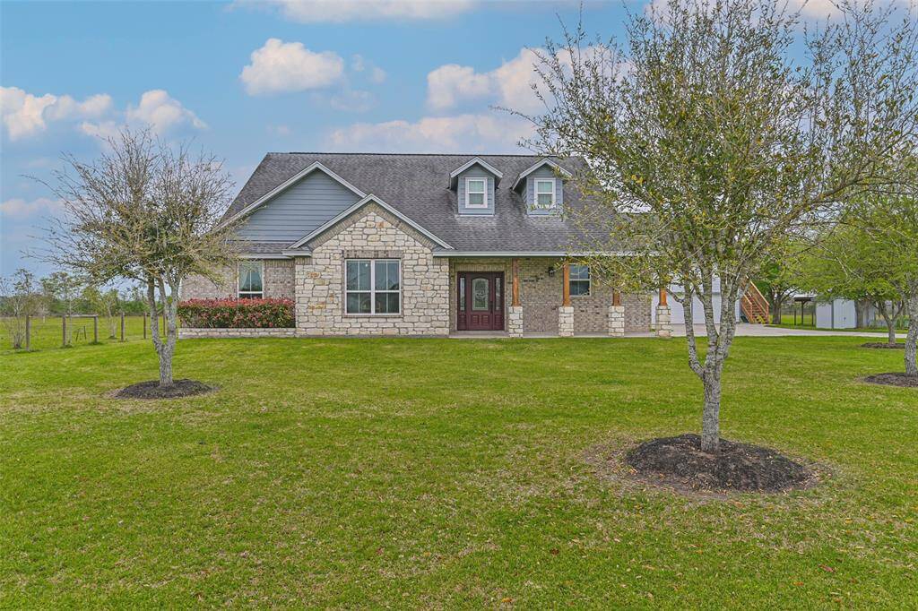 Country living close to city amenities. Custom built home located on 1.9 acres with a garage apartment.