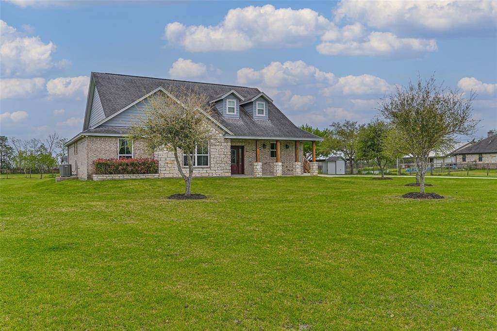 Country living close to city amenities. Custom built home located on 1.9 acres with a garage apartment.