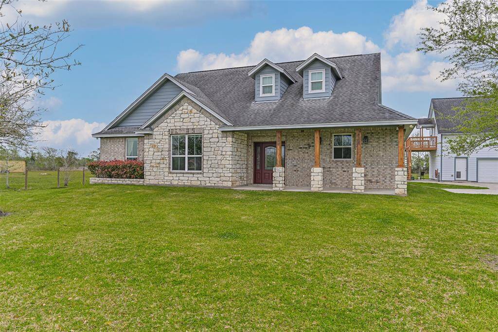 Country living close to city amenities. Custom built home located on 1.9 acres with a garage apartment.