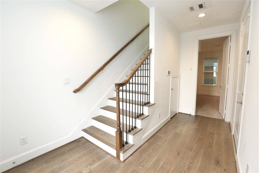 Back down to 1st floor; storage under staircase