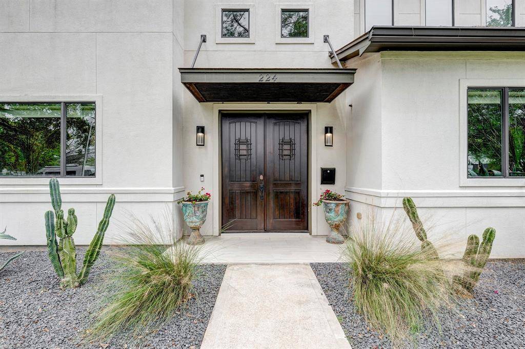 From the moment you walk up to the mahogany doors, the desert landscaping makes you feel like you are stepping into a Santa Fe masterpiece.