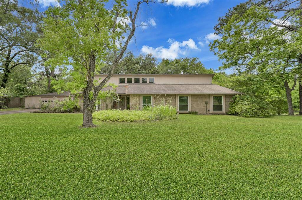 Welcome to 22423 Lakeway Drive. This 4 bedroom 2.5 bath home has amazing space inside and out. 2.14 acres in a quiet neighborhood with lake views and no restrictions.