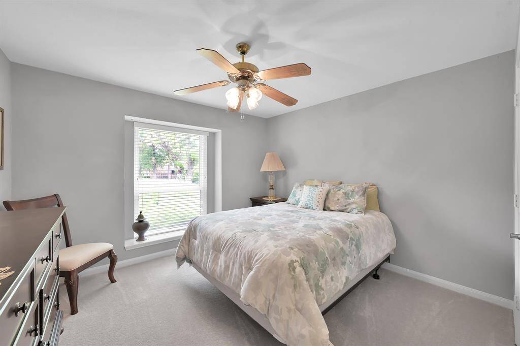 Secondary bedroom with plenty of space for oversized furniture. Nice size walk in closet.