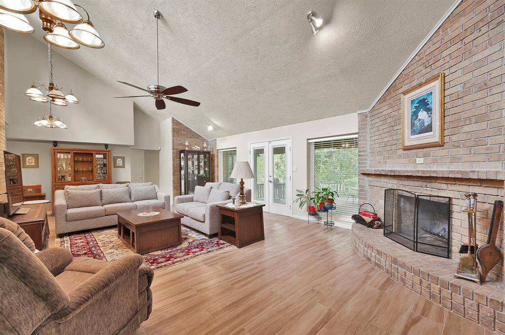Enjoy beautiful views from the den looking out to the back of the home.