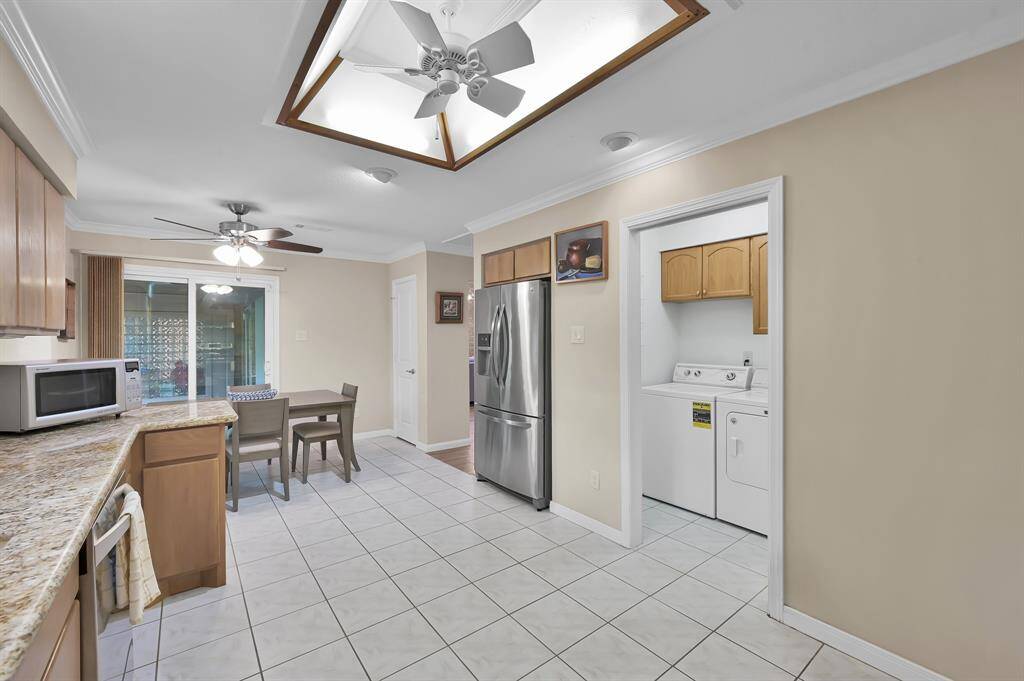 Laundry room and half bath located off of the kitchen.