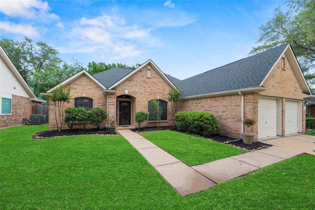 Welcoming friends and family at this charming front porch