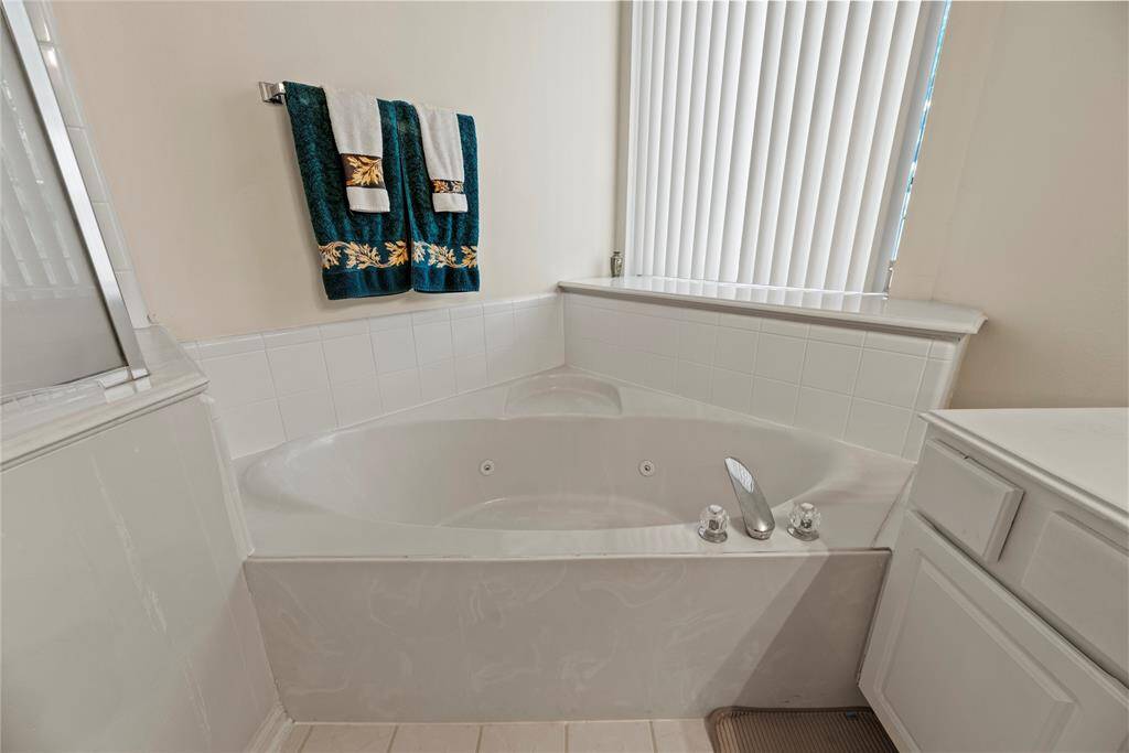 Relax in your deep soaking tub or opt for a quick rinse in the separate shower.
