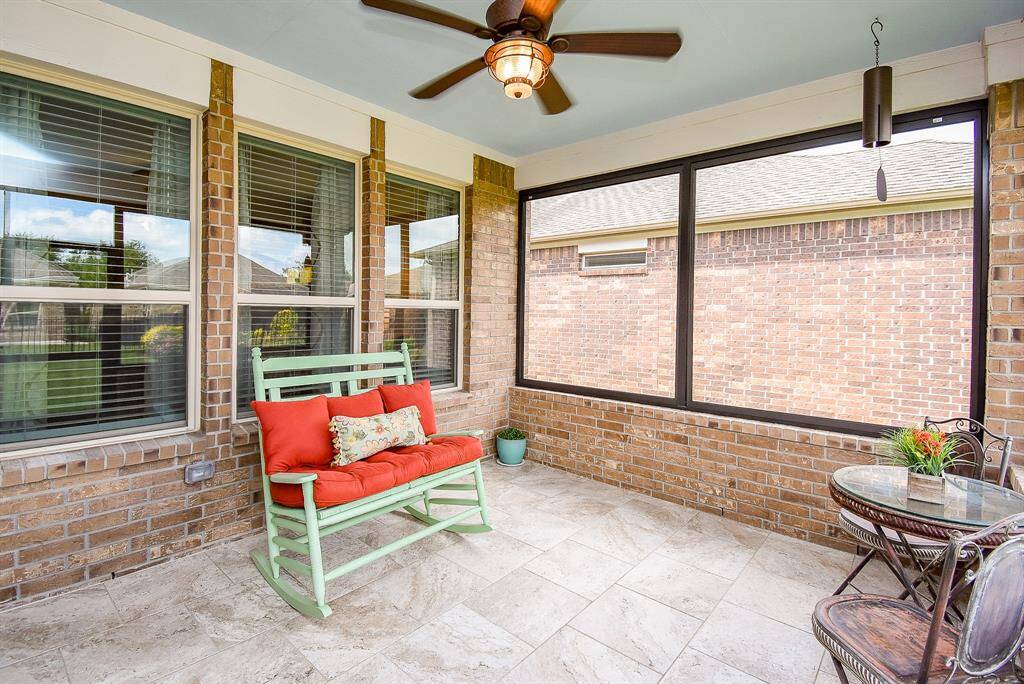 Another view of your outdoor living space showcases just how inviting and versatile it is. Whether you're spending time with family or hosting friends, this is the perfect setting for effortless and enjoyable entertaining.