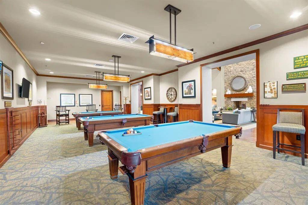 Whether you're enjoying a friendly game of pool or relaxing in the library with neighbors, everything you need is available to you as a resident of this vibrant community at the Lake House.