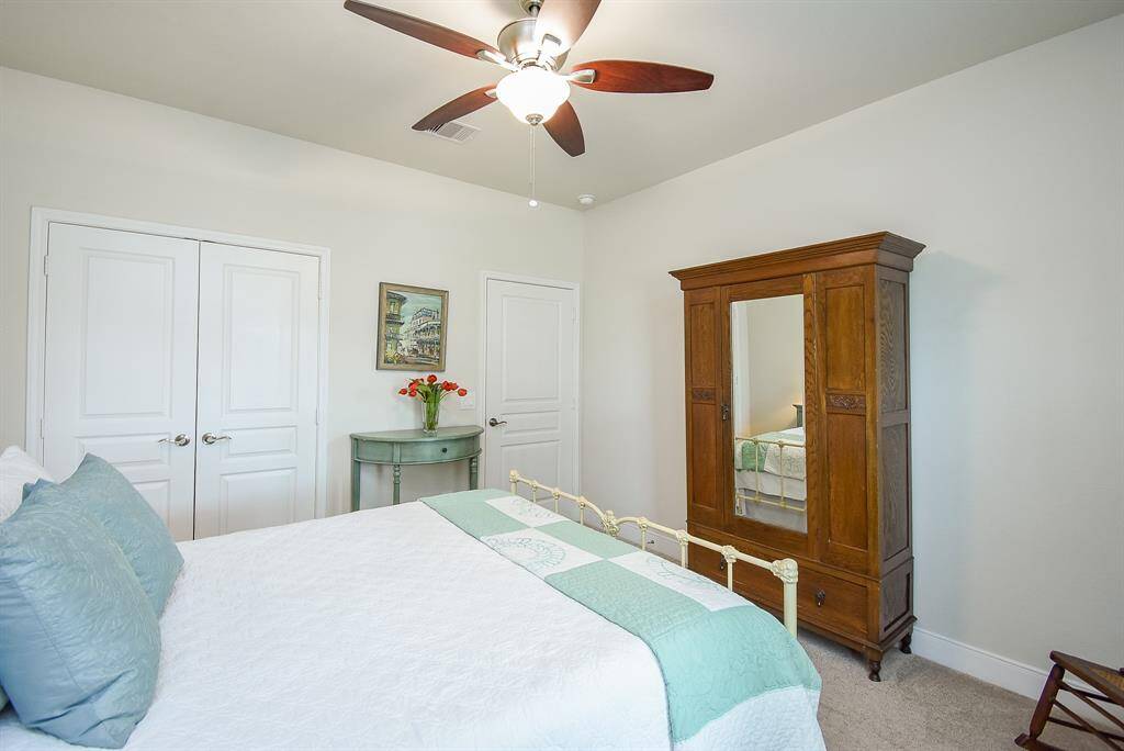 Another view of the secondary bedroom highlights its generous size—there's plenty of space to accommodate oversized furniture comfortably.