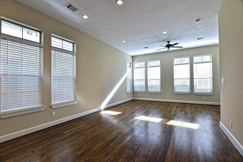 Alternate photo of Living and Dining areas with no furniture...those floors though!