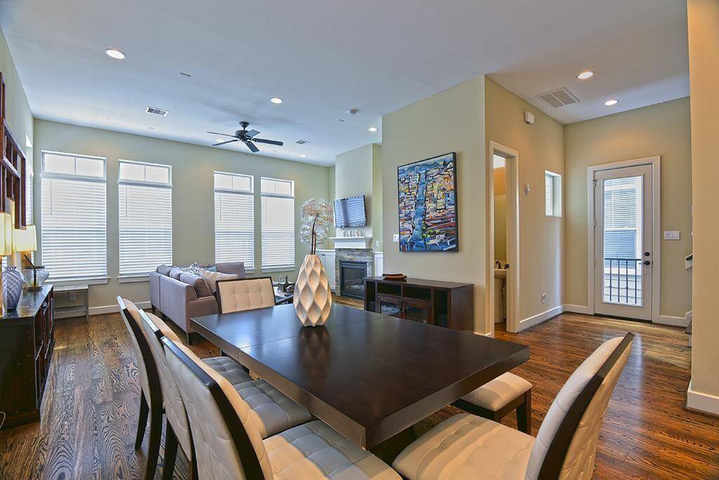 Powder room is tucked into the hallway off the main living space