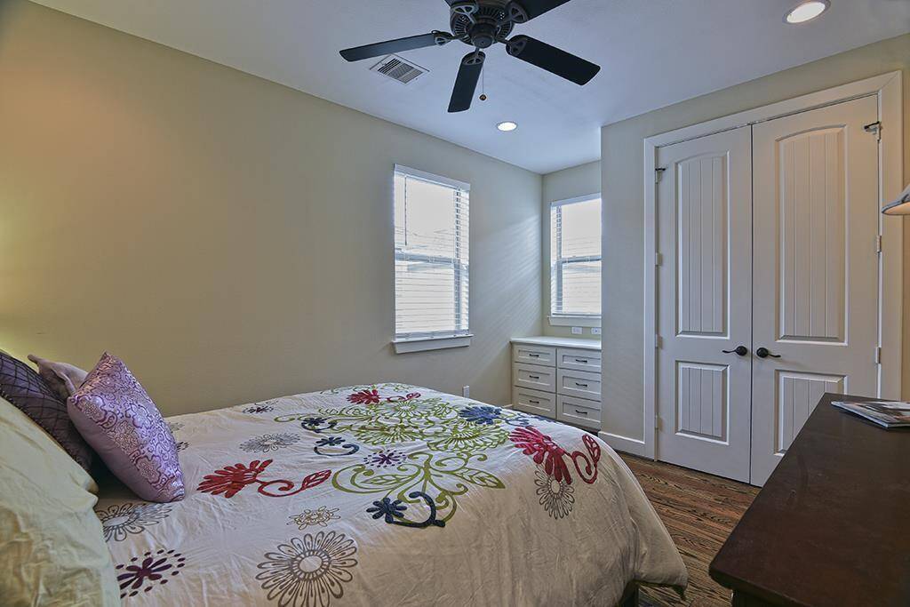 Secondary bedroom on the 3rd floor has built-ins