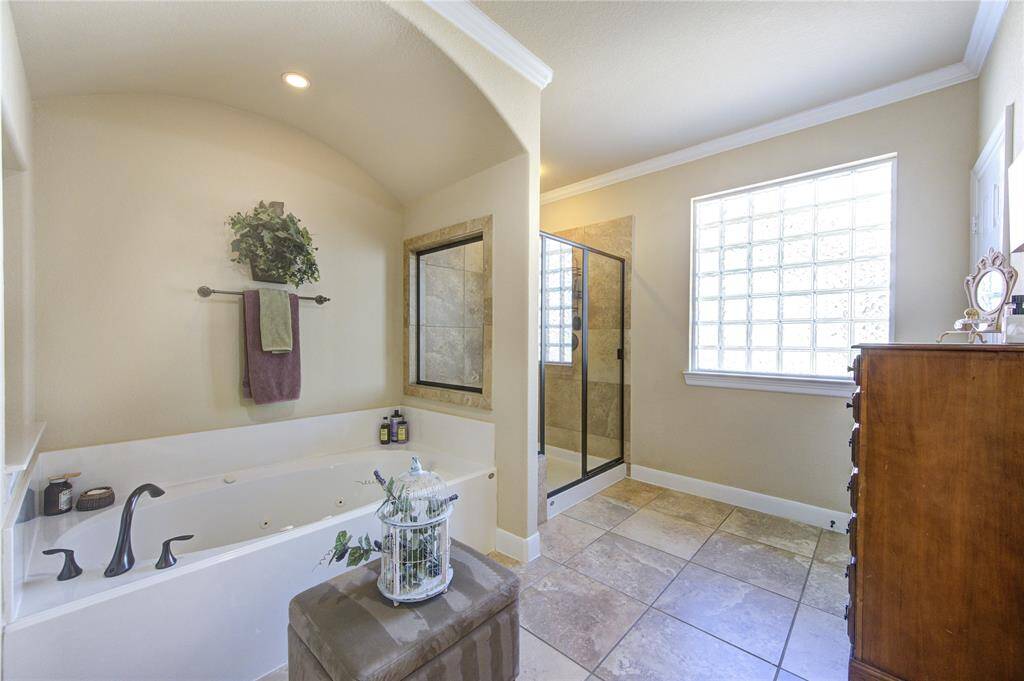 Jetted Soaking Tub and Stand alone Shower with Seat