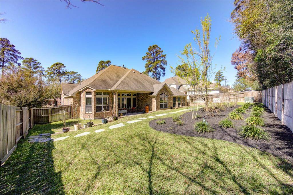 Oversized yard with pear tree